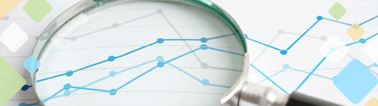 stock image of a magnifying glass and a graph